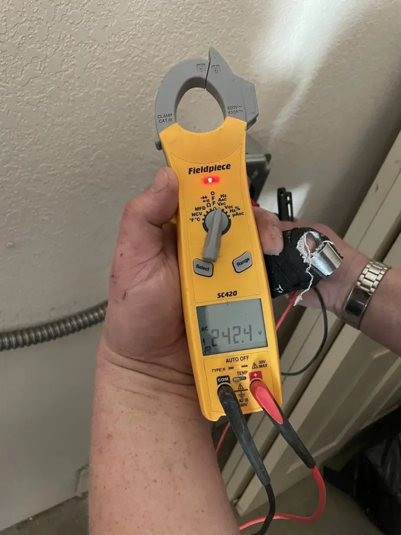 Voltage testing with clamp meter during Hot Tub / Pool Electrical Wiring in Boulder Hill